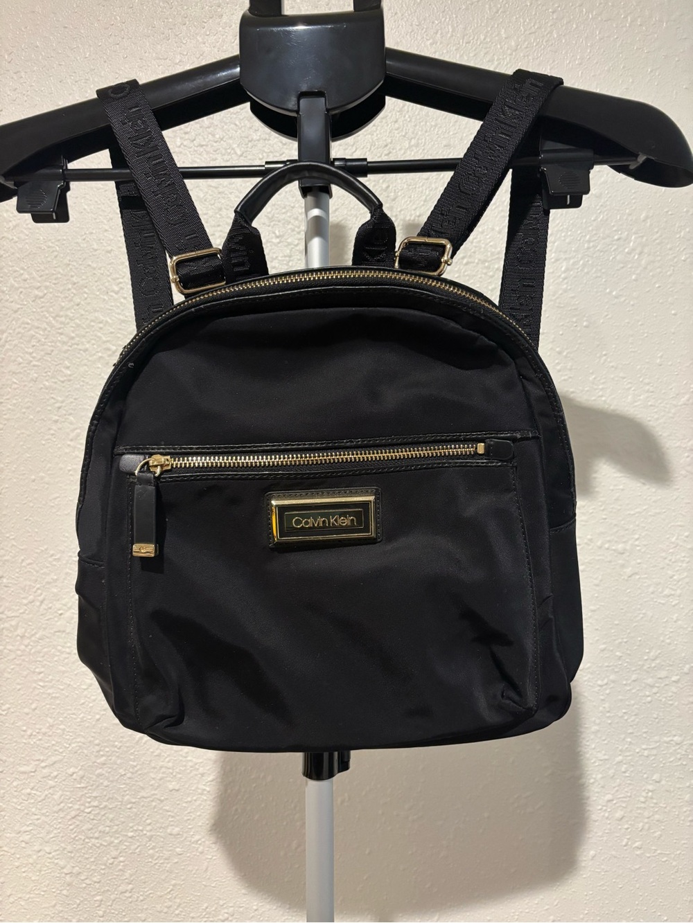 Calvin Klein Black Mini Backpack with Gold Accents